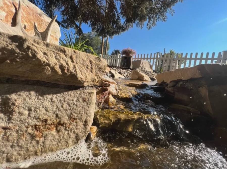 TC Scapes custom waterfall water feature landscaping Utah